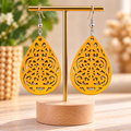 Boucles d’oreilles pendantes jaune moutarde à motifs ajourés