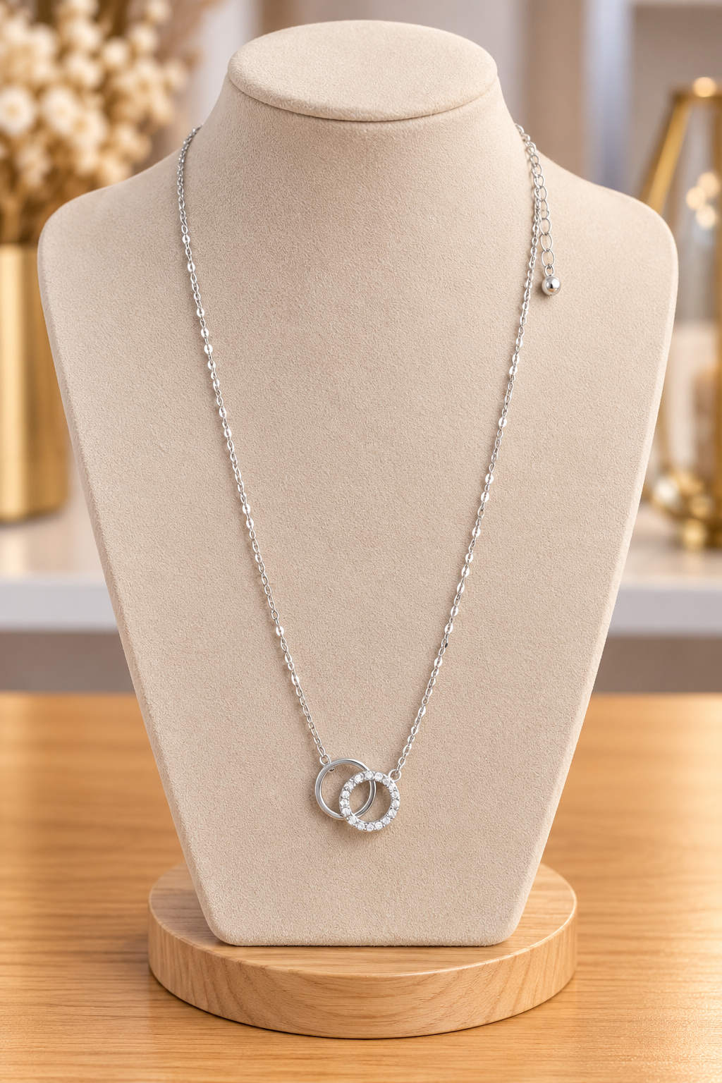 Collier argenté avec pendentif double anneau brillant – Kanèoré
