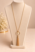 Collier long doré avec pendentif cercle et pompon – Kanèoré